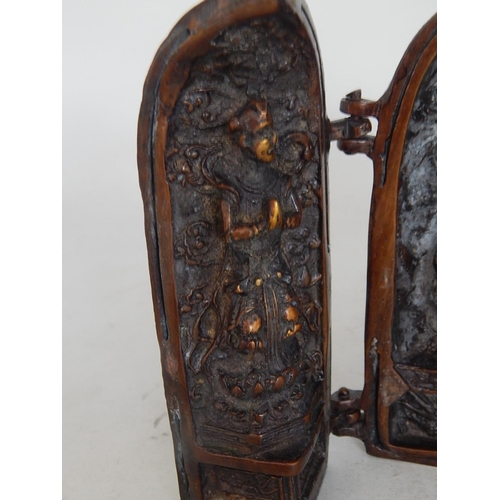 488 - A Chinese Bronze Triptych Shrine with character marks to the doors: Measures 13.5cm high