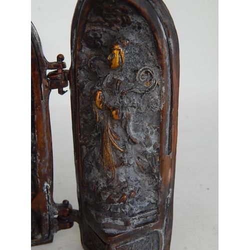 488 - A Chinese Bronze Triptych Shrine with character marks to the doors: Measures 13.5cm high