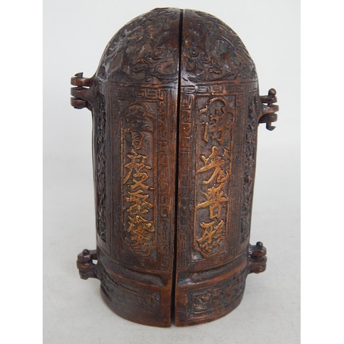 488 - A Chinese Bronze Triptych Shrine with character marks to the doors: Measures 13.5cm high