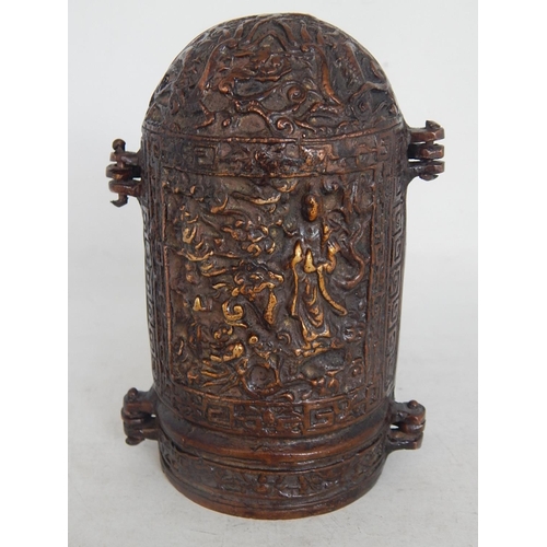 488 - A Chinese Bronze Triptych Shrine with character marks to the doors: Measures 13.5cm high