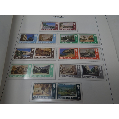 59 - Gibraltar collection inc Postage Dues and mini sheets in blue Davo album