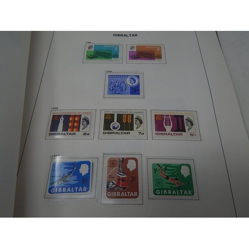 59 - Gibraltar collection inc Postage Dues and mini sheets in blue Davo album