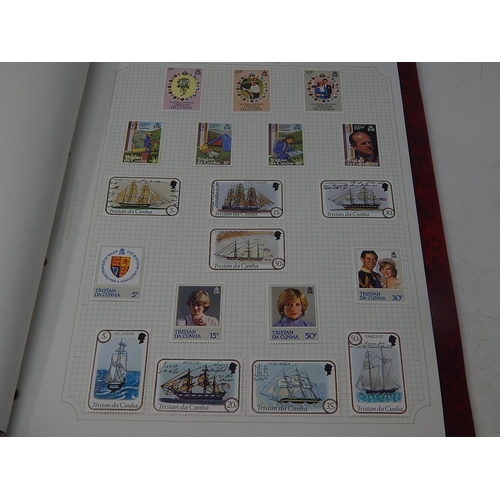 72 - Trinidad and Tobago, Tristan da Cunha inc mini sheets housed in maroon Stanley Gibbons Avon album