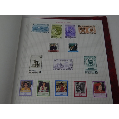 72 - Trinidad and Tobago, Tristan da Cunha inc mini sheets housed in maroon Stanley Gibbons Avon album