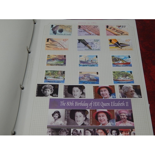 72 - Trinidad and Tobago, Tristan da Cunha inc mini sheets housed in maroon Stanley Gibbons Avon album