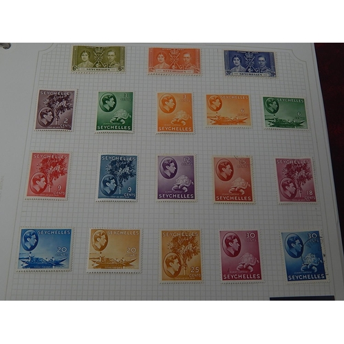 74 - Seychelles/Singapore collection housed in maroon Stanley Gibbons Avon album