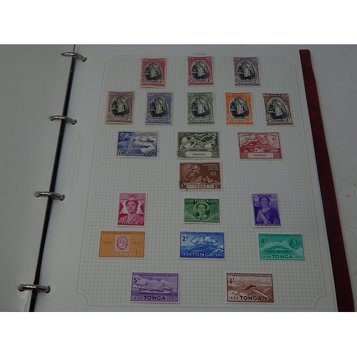 76 - Tonga collection housed in maroon Stanley Gibbons Avon album