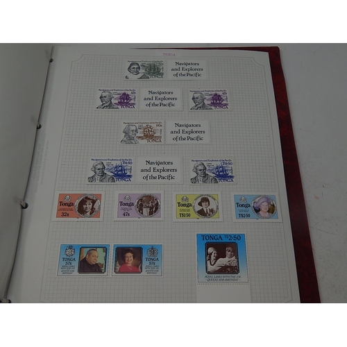 76 - Tonga collection housed in maroon Stanley Gibbons Avon album