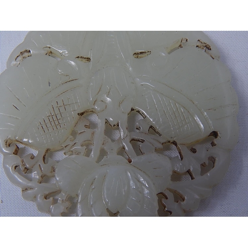 585 - Chinese Jade Plaque Depicting a Moth/Butterfly: Measures 5cm diameter