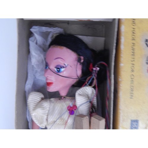 598 - Pelham Puppet in original box together with a tin plate clockwork motorcycle & sidecar with key: Woo... 