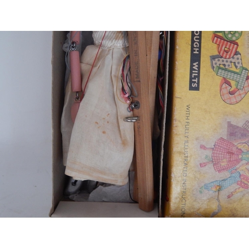 598 - Pelham Puppet in original box together with a tin plate clockwork motorcycle & sidecar with key: Woo... 