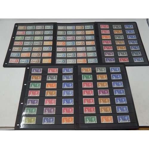 108 - A large selection of 1937 Coronation stamps and 1946 Victory Stamps all Mint housed on 5 Hagner shee... 