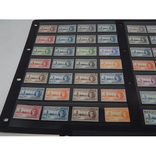 108 - A large selection of 1937 Coronation stamps and 1946 Victory Stamps all Mint housed on 5 Hagner shee... 