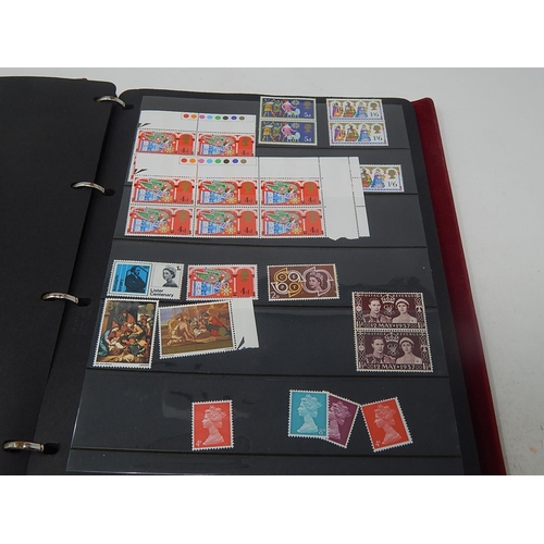 121 - A superb collection of Mint Pre-Decimal Stamps including George VI in blocks, etc housed in maroon c... 