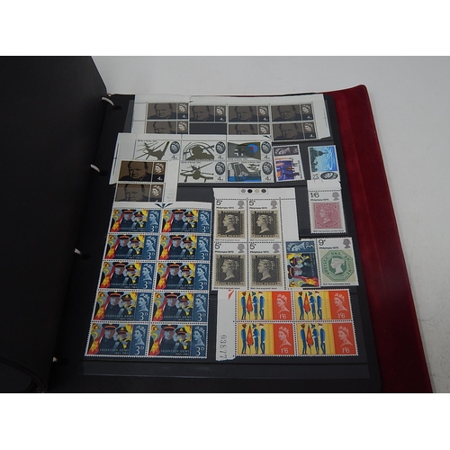 121 - A superb collection of Mint Pre-Decimal Stamps including George VI in blocks, etc housed in maroon c... 