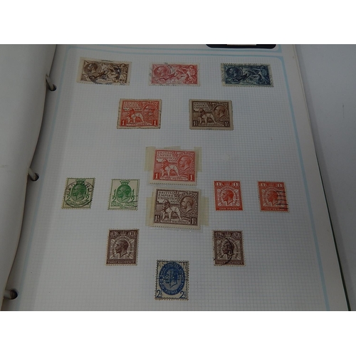 129 - A magnificent collection of stamps from Queen Victoria including a Penny Black, several 2d Blues, a ... 