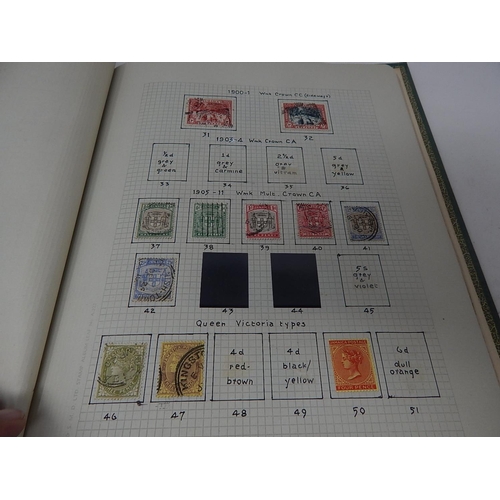 142 - Extensive Jamaica collection housed in vintage green album