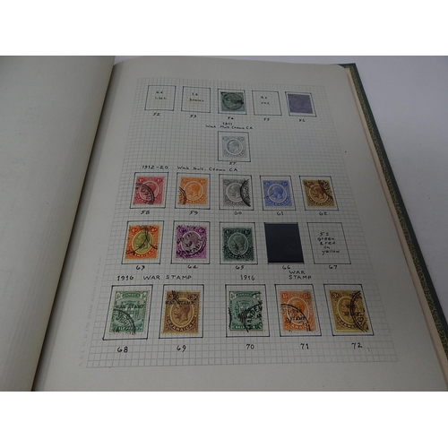 142 - Extensive Jamaica collection housed in vintage green album