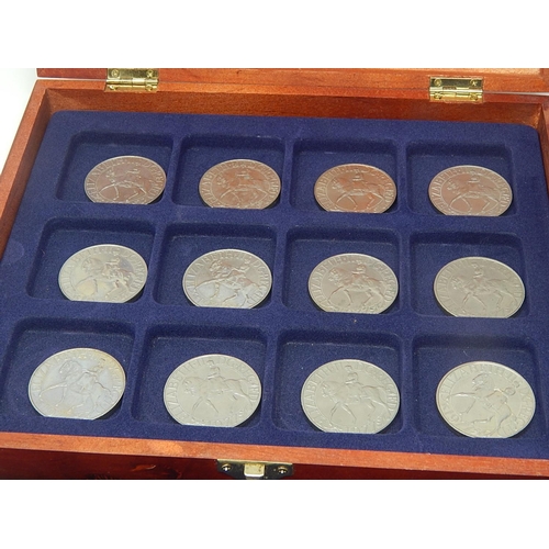 152 - A collectors coin box containing a tray of 12 x 1972 Silver Wedding Crowns, and a tray of 12 x 1977 ... 