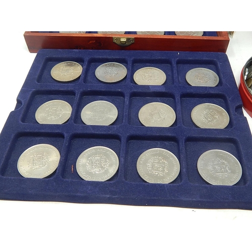 152 - A collectors coin box containing a tray of 12 x 1972 Silver Wedding Crowns, and a tray of 12 x 1977 ... 