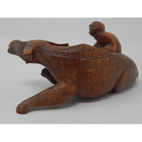 609 - Chinese Carved Wooden Ox with a Figure on Its Back: Measures 14cm wide: A/F