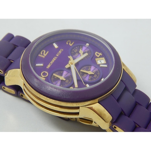 499C - MICHAEL KORS: Chronograph Wristwatch with Date Aperture: Working when catalogued