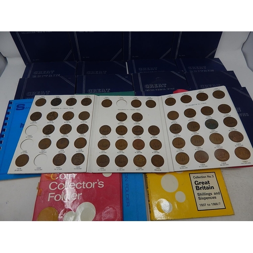 1 - A large collection of coins housed in vintage Whitman and other folders, together with some empty fo... 