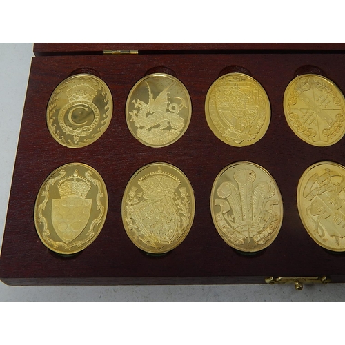 12 - The Arms of the Prince and Princess of Wales struck as solid Sterling Twelve Silver Ingots plated wi... 