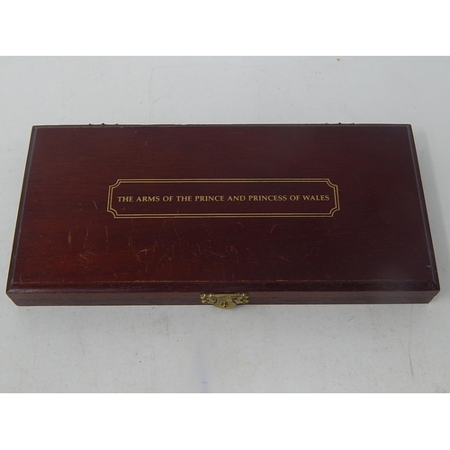 12 - The Arms of the Prince and Princess of Wales struck as solid Sterling Twelve Silver Ingots plated wi... 