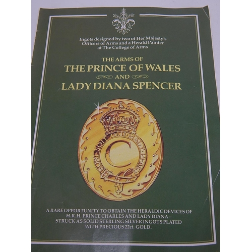 12 - The Arms of the Prince and Princess of Wales struck as solid Sterling Twelve Silver Ingots plated wi... 