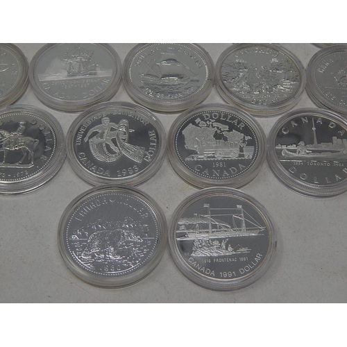 25 - Collection of 21 Canada Silver Dollars with COA's all about as struck