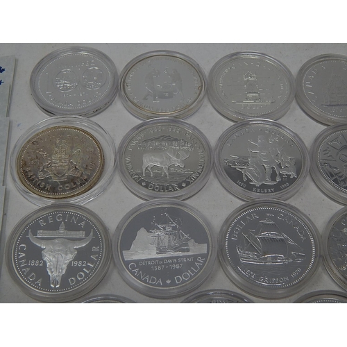 25 - Collection of 21 Canada Silver Dollars with COA's all about as struck