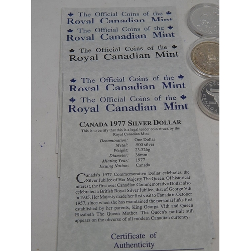25 - Collection of 21 Canada Silver Dollars with COA's all about as struck