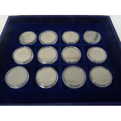 80 - Collectors box containing a selection of 24 Crowns in capsules