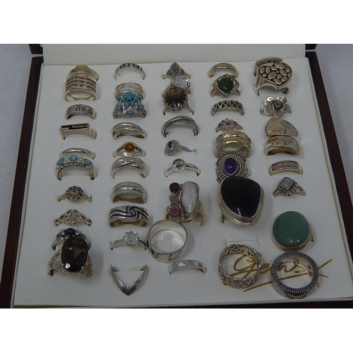 88 - A collection of .925 Sterling Silver rings in display case