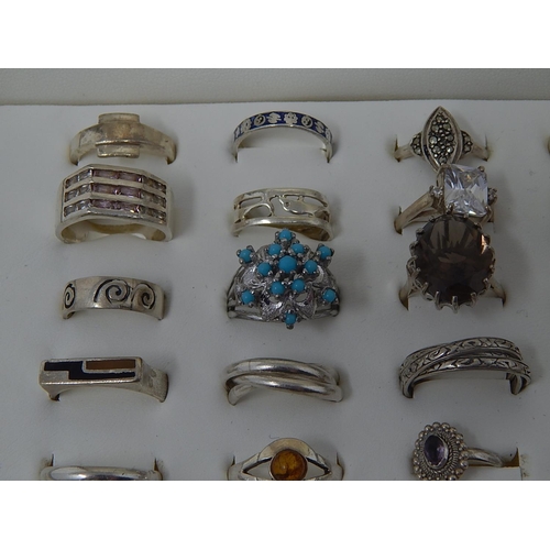 88 - A collection of .925 Sterling Silver rings in display case