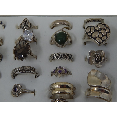 88 - A collection of .925 Sterling Silver rings in display case