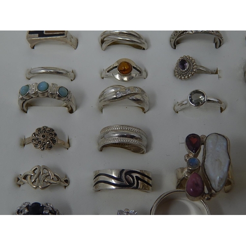 88 - A collection of .925 Sterling Silver rings in display case