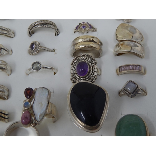 88 - A collection of .925 Sterling Silver rings in display case