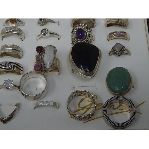 88 - A collection of .925 Sterling Silver rings in display case