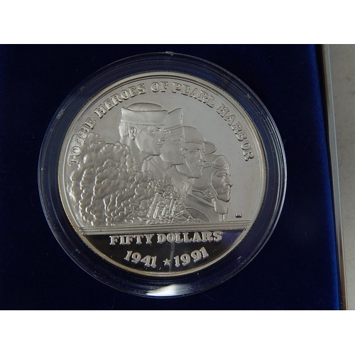 104 - Isle of Man Proof Silver £1 in fitted case; Marshall Islands 1991 Proof Silver $50 containing One Tr... 