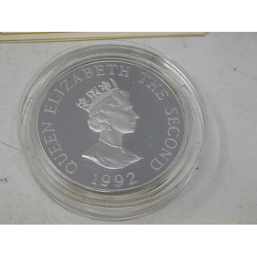 104 - Isle of Man Proof Silver £1 in fitted case; Marshall Islands 1991 Proof Silver $50 containing One Tr... 