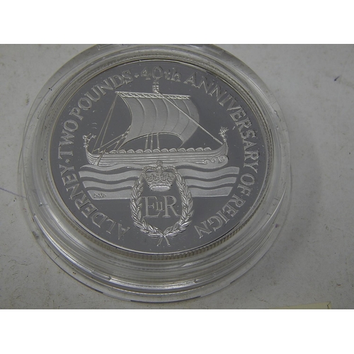 104 - Isle of Man Proof Silver £1 in fitted case; Marshall Islands 1991 Proof Silver $50 containing One Tr... 