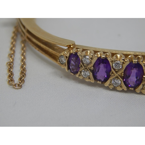 270 - Diamond & Amethyst Set Bangle in Hallmarked 9ct Gold with Safety Chain: Gross Weight 14.5g