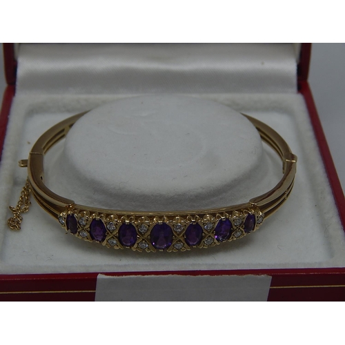 270 - Diamond & Amethyst Set Bangle in Hallmarked 9ct Gold with Safety Chain: Gross Weight 14.5g