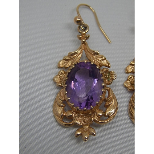 271 - Pair of Large Amethyst Set Earrings in Hallmarked 9ct Gold: 3.6cm Drop.