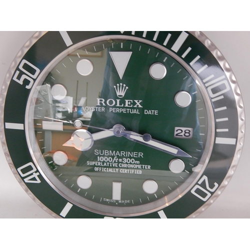 319 - Rolex Submariner Dealers Clock with Date Aperture: Measures 33.5cm diameter.