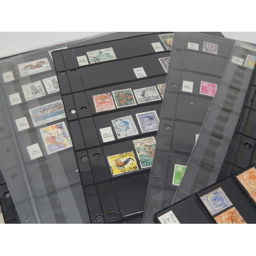 228 - Enormous collection of stamps housed on many large Double Sided Hagner Sheets inc Hong Kong, Malaysi... 