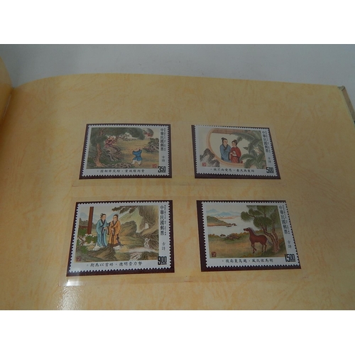 235 - A collection of China stamps etc in folders