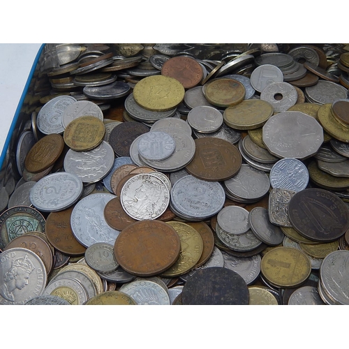 206 - Large tin of World coinage totally unsorted weighing 6.9 kilos gross